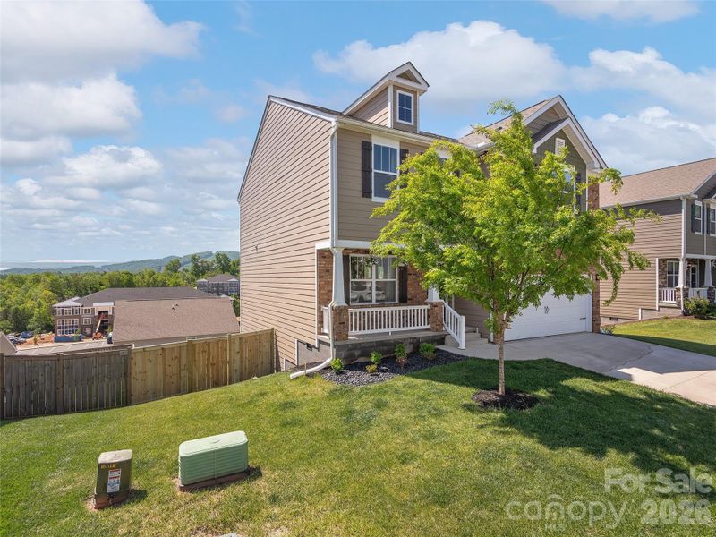 Exterior details and patio area of a home in , Candler (Image 23).