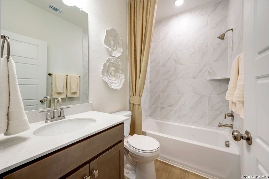 Furnished interior view inside a new home in Nopal Valley, San Antonio (Image 12).