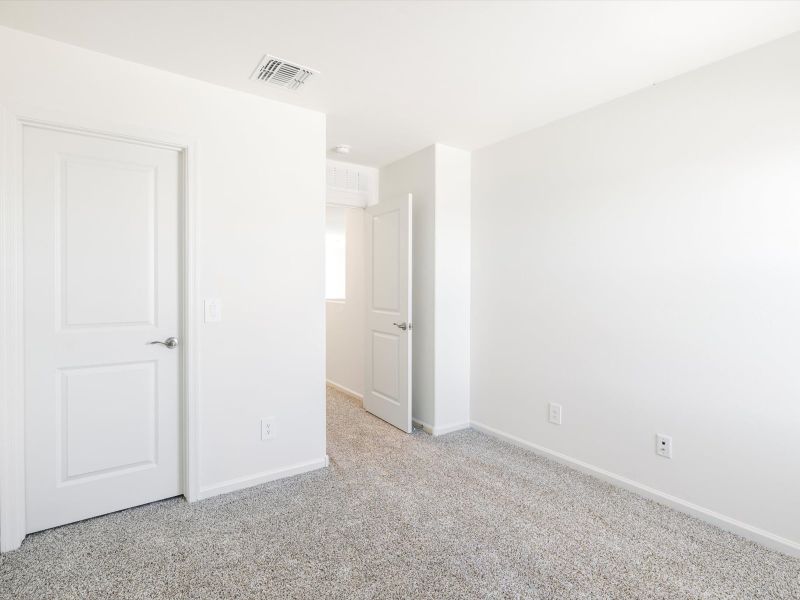 Spacious, unfurnished interior of a new home in Mandarina - Signature Series, Marana (Image 12).