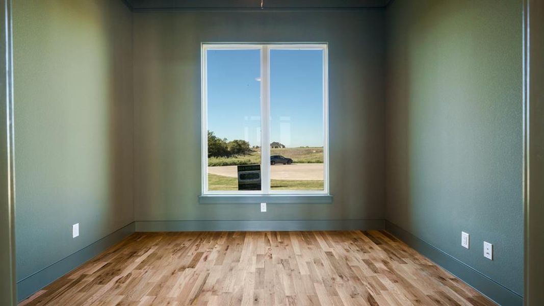 Spare room with light hardwood / wood-style floors