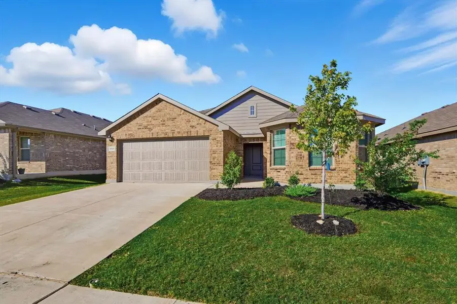 2nd view of front ranch style home with driveway, garage 2nd view of front ranch style home with driveway, garage