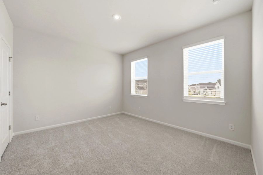 Spacious, unfurnished interior of a new home in Blue Heron Retreat, Little River (Image 19).