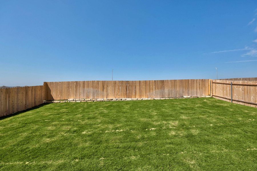 Front exterior of a new home in Salerno - Classic Collection, Round Rock, TX, highlighting curb appeal (Image 23). Front exterior of a new home in Salerno - Classic Collection, Round Rock, TX, highlighting curb appeal (Image 23).