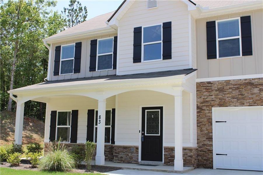Front exterior of a new home in , Dallas, GA, highlighting curb appeal (Image 34). Front exterior of a new home in , Dallas, GA, highlighting curb appeal (Image 34).