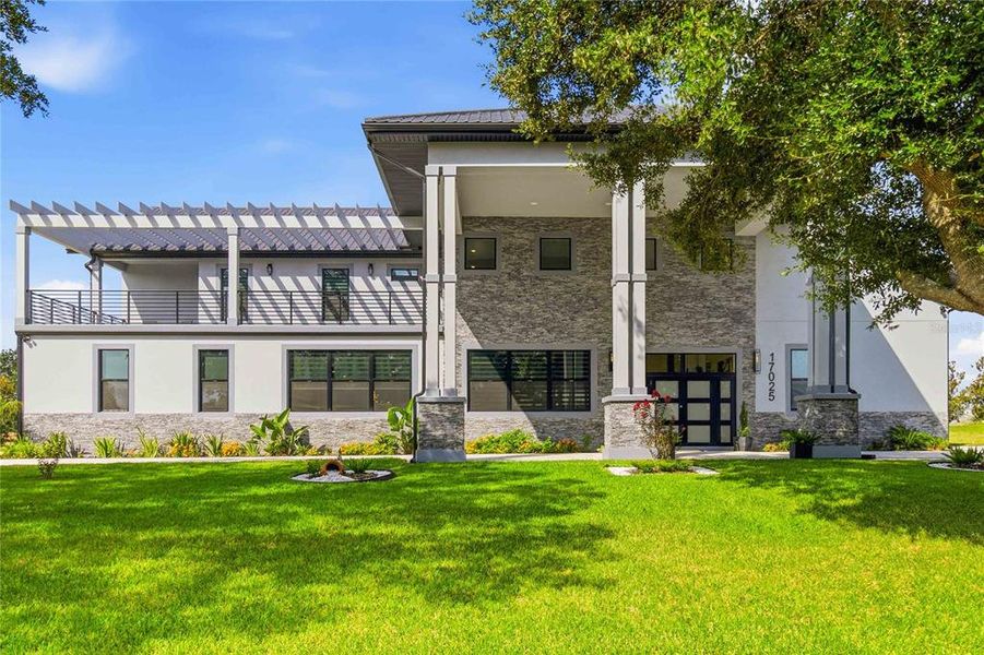 Exterior details and patio area of a home in , Groveland (Image 31).