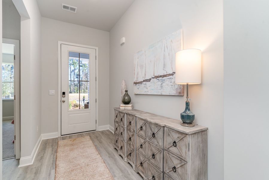 Representative furnished interior of a home built from the LITCHFIELD by D.R. Horton in Ranch Haven, Murrells Inlet (Image 3).