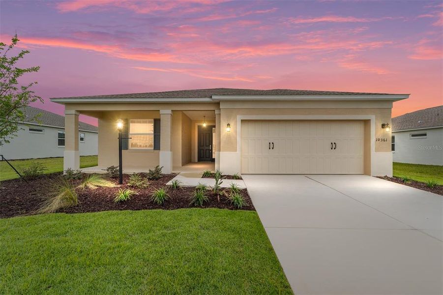 Front exterior of a new home in On Top of the World Communities, Ocala, FL, highlighting curb appeal (Image 23).