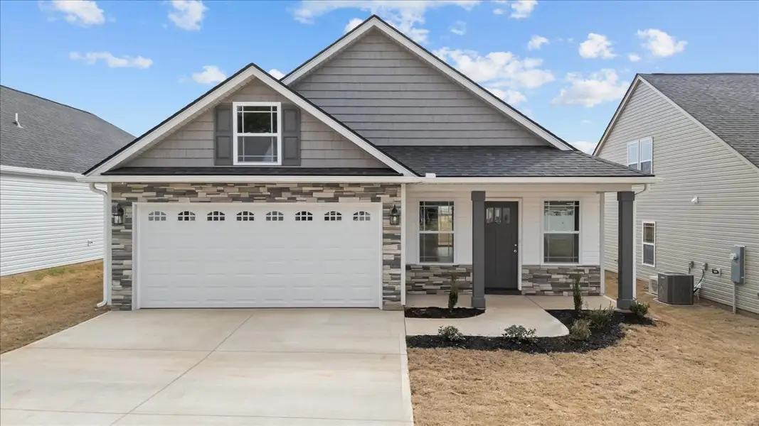 Representative exterior photo of a completed home built from the Ellison by Enchanted Homes in Mills Gin, Campobello, SC (Image 1).