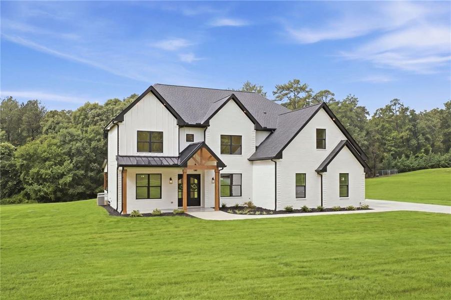 Front exterior of a new home in , Jefferson, GA, highlighting curb appeal (Image 37).