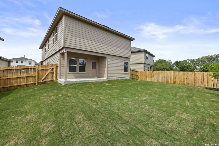 Exterior details and patio area of a home in Redbird Ranch, San Antonio (Image 2).