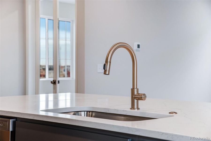 Close-up of interior finishes inside a home in Painted Prairie, Aurora (Image 18).
