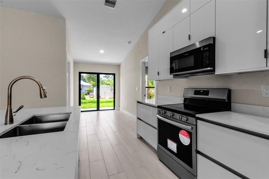Furnished interior view inside a new home in , Punta Gorda (Image 16).