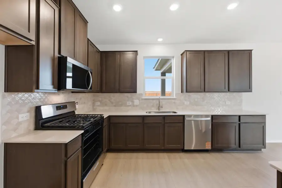 Furnished interior view inside a new home in Salerno - Heritage Collection, Round Rock (Image 7). Furnished interior view inside a new home in Salerno - Heritage Collection, Round Rock (Image 7).