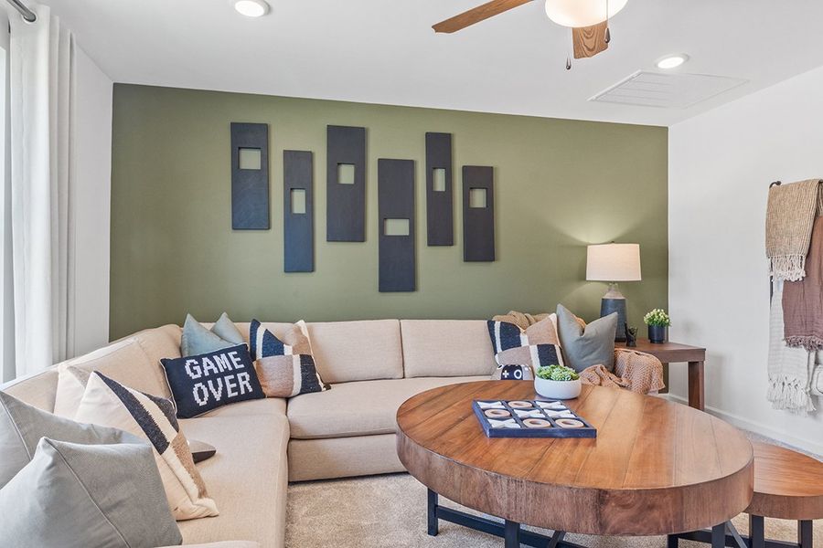 A living room with a couch and a coffee table.