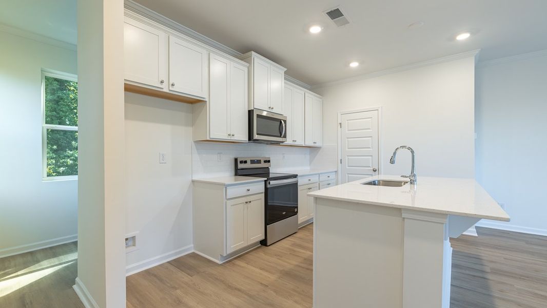 Furnished interior view inside a new home in Benteen Reserve, Atlanta (Image 5).