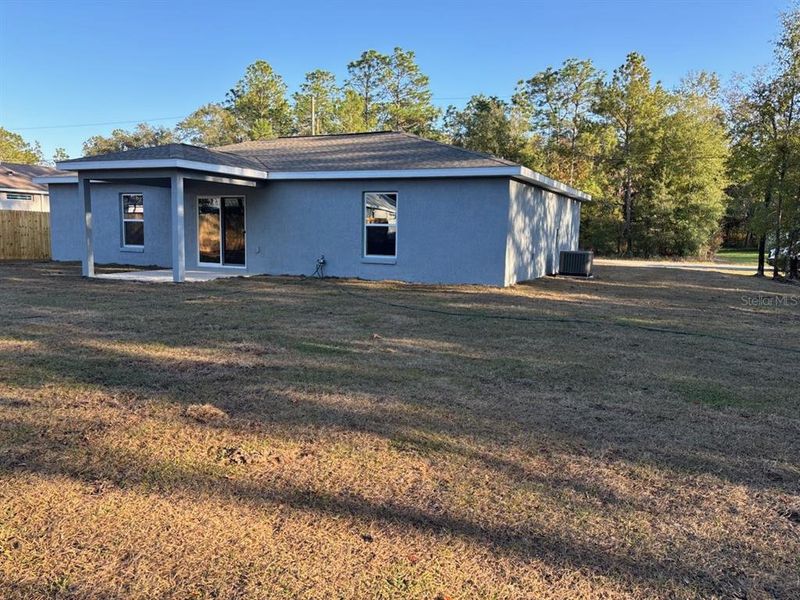 Exterior details and patio area of a home in , Citrus Springs (Image 16).