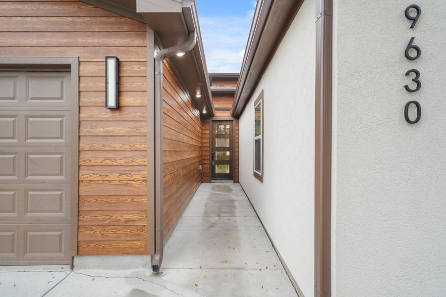 Exterior details and patio area of a home in , Houston (Image 4).