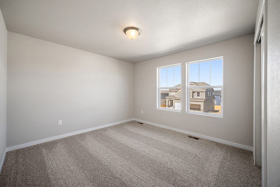 Spacious, unfurnished interior of a new home in Ridge at Lorson Ranch, Colorado Springs (Image 30).