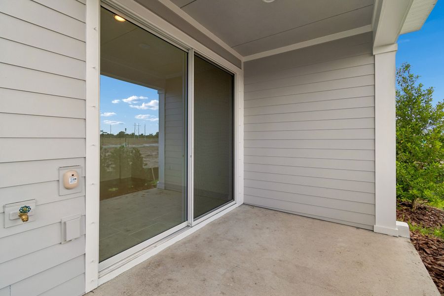 Representative exterior details of a home built from the The Burney by David Weekley Homes in Waterset Townhomes, Apollo Beach (Image 3).