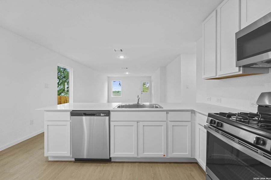 Furnished interior view inside a new home in Waterwheel, San Antonio (Image 6).