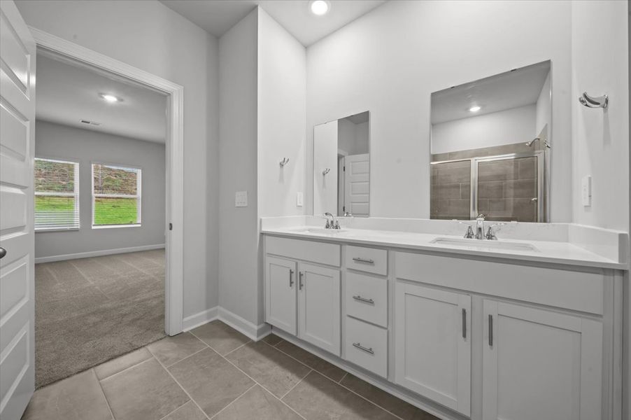 Furnished interior view inside a new home in The Farm at Wells Creek - Signature Collection, Gray Court (Image 9).