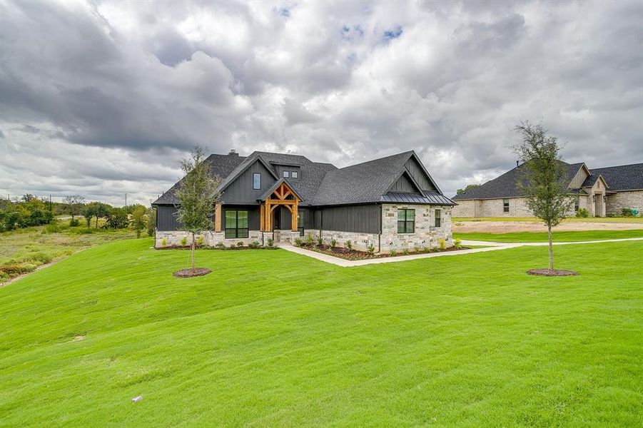 Beautiful new build by VictorE Homebuilders! Set on 1 acre with pretty views!