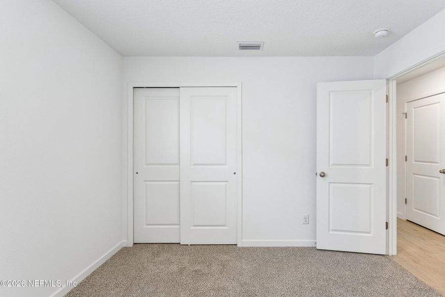 Spacious, unfurnished interior of a new home in Lakes at Bella Lago – Classic Series, Green Cove Springs (Image 26).