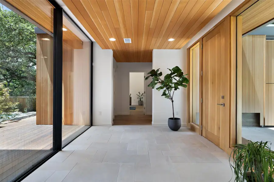 Hall featuring wood ceiling and recessed lighting