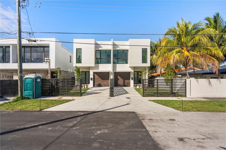 Front exterior of a new home in , Miami, FL, highlighting curb appeal (Image 28). Front exterior of a new home in , Miami, FL, highlighting curb appeal (Image 28).