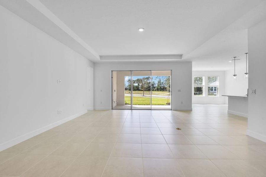 Spacious, unfurnished interior of a new home in Ardisia Park, New Smyrna Beach (Image 25).