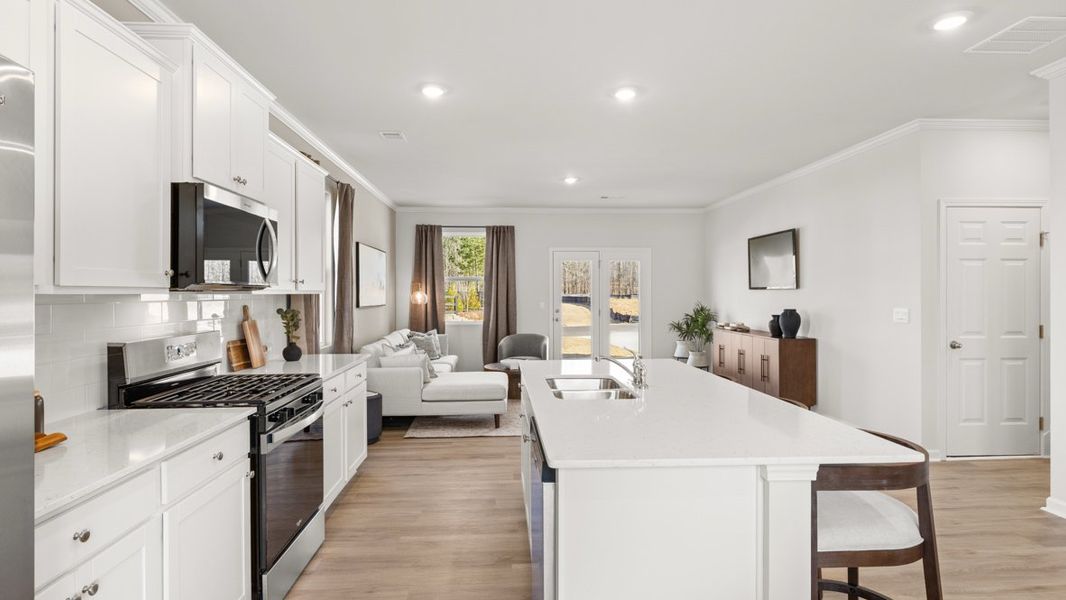 Representative furnished interior of a home built from the Elbert ll by D.R. Horton in Braselton Village, Braselton (Image 11).