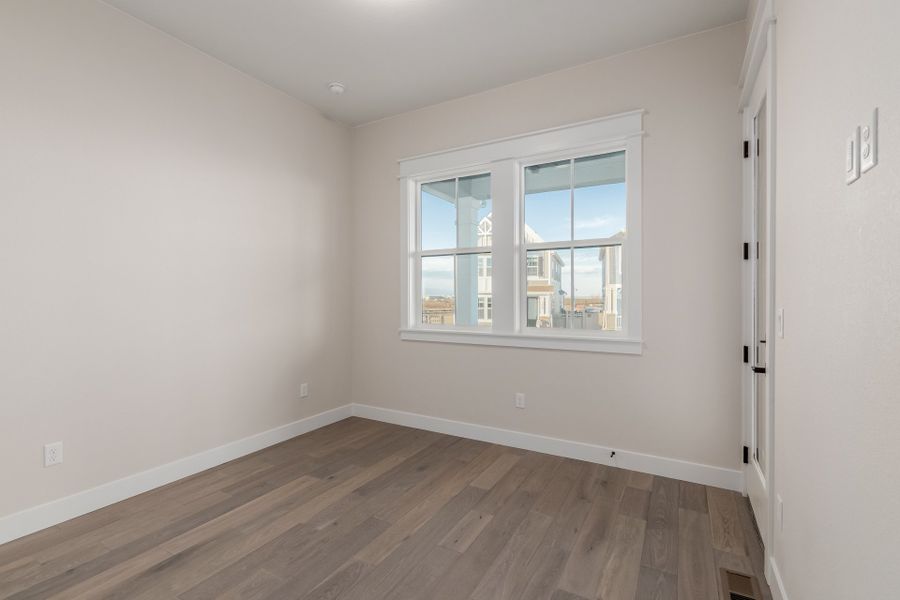Representative unfurnished interior of a home built from the Luxe by Scott Felder Homes in Westerly, Erie (Image 40).