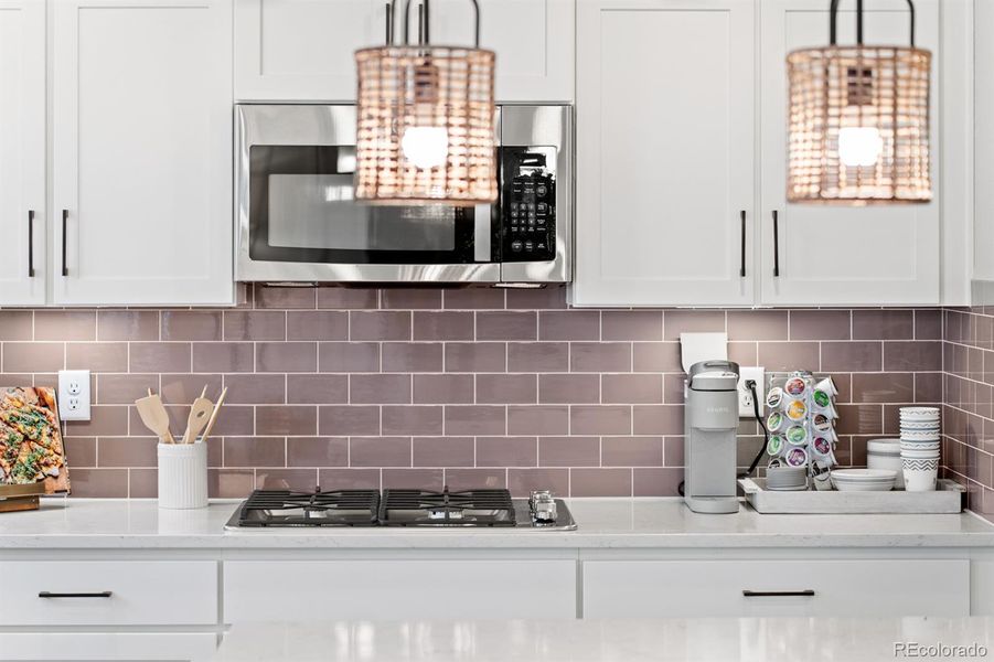 Photos shown are of a previously built model home and are intended to represent the floor plan. The home currently available may include different finishes, features, and selections.