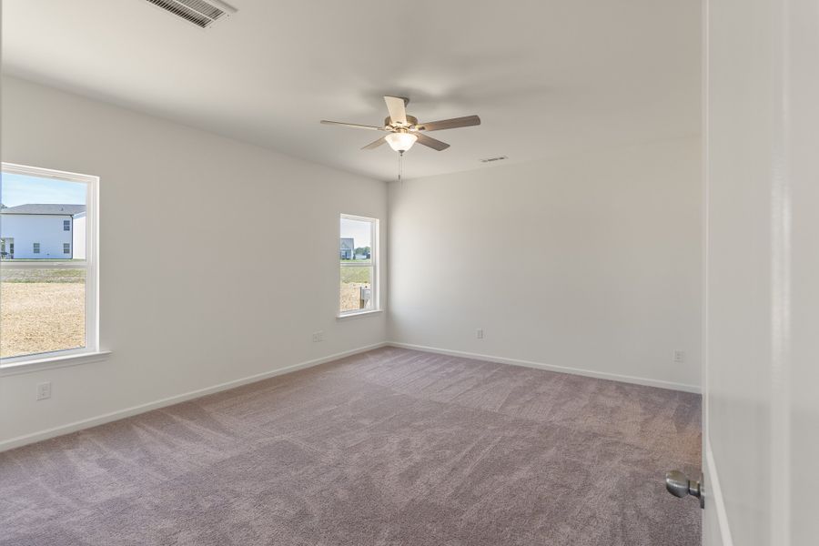 Spacious, unfurnished interior of a new home in The Exchange, Vass (Image 19).