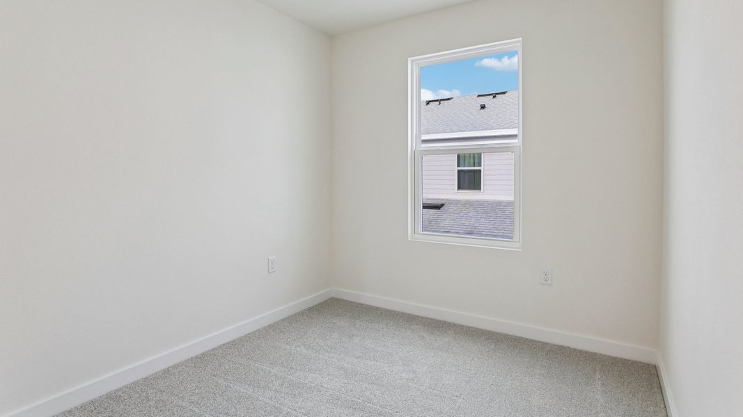Furnished interior view inside a new home in Cyrene at Harmony, St. Cloud (Image 25).