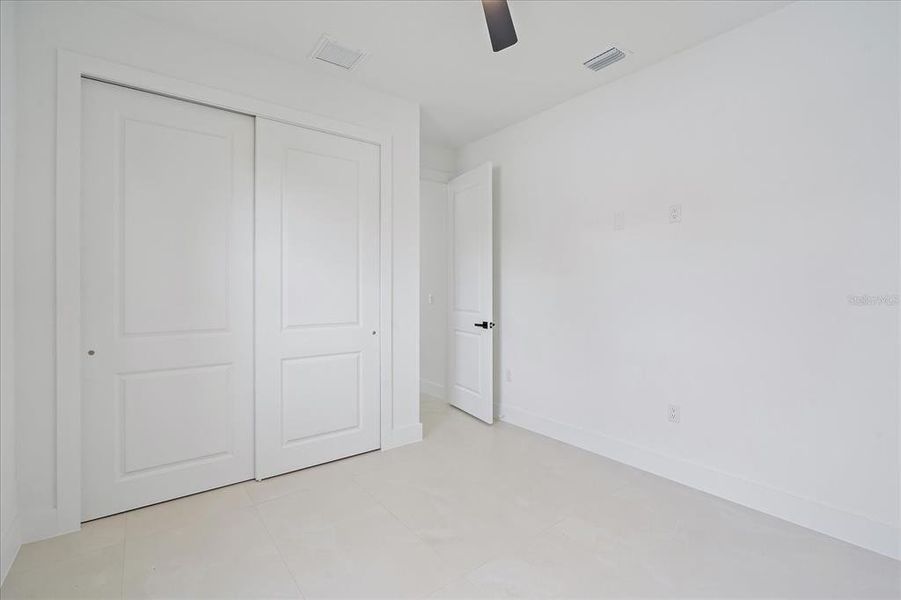 Spacious, unfurnished interior of a new home in , Port Charlotte (Image 24).