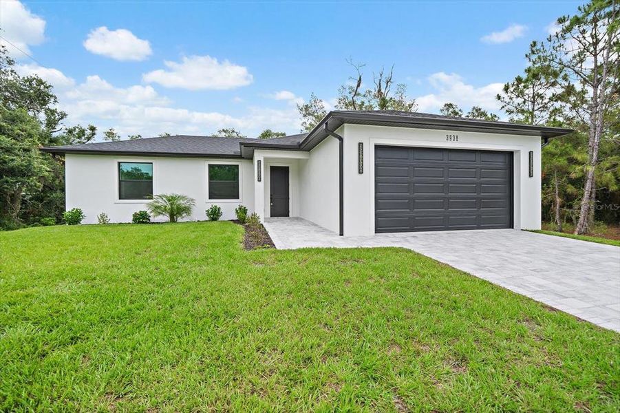 Front exterior of a new home in , North Port, FL, highlighting curb appeal (Image 20).