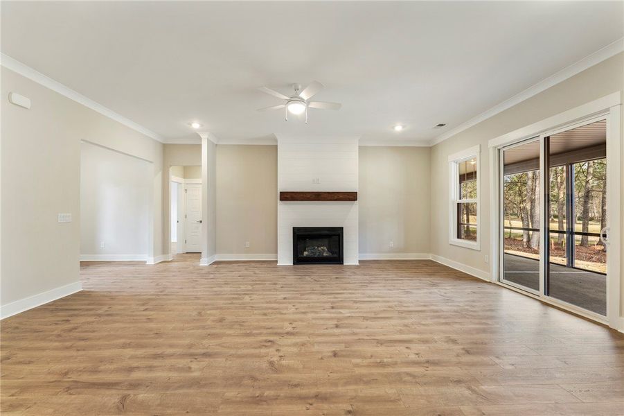 This bright space offers rich wood floors and abun
