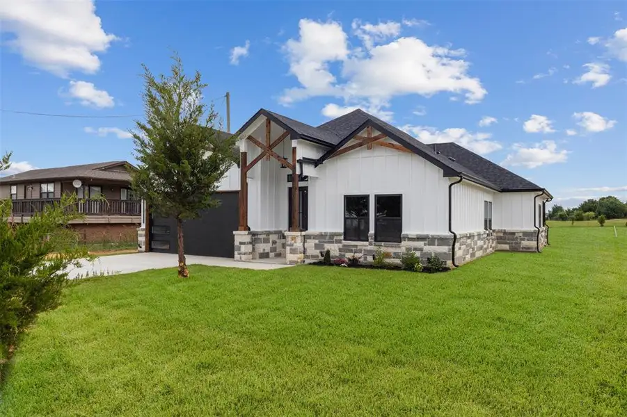 Front exterior of a new home in , Alvarado, TX, highlighting curb appeal (Image 2). Front exterior of a new home in , Alvarado, TX, highlighting curb appeal (Image 2).