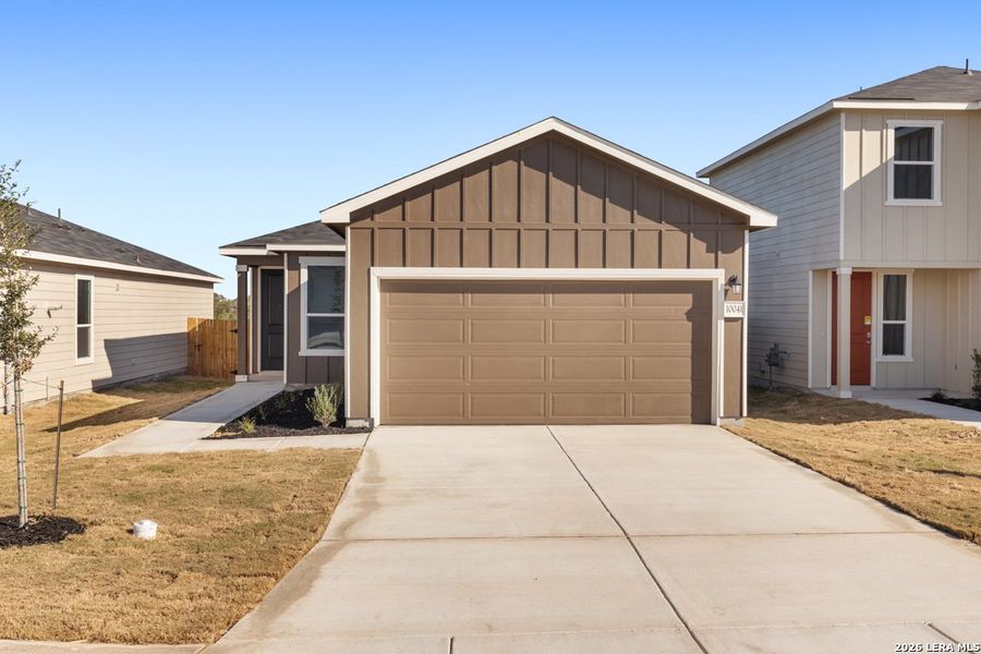Front exterior of a new home in Punta Verde, Converse, TX, highlighting curb appeal (Image 20).