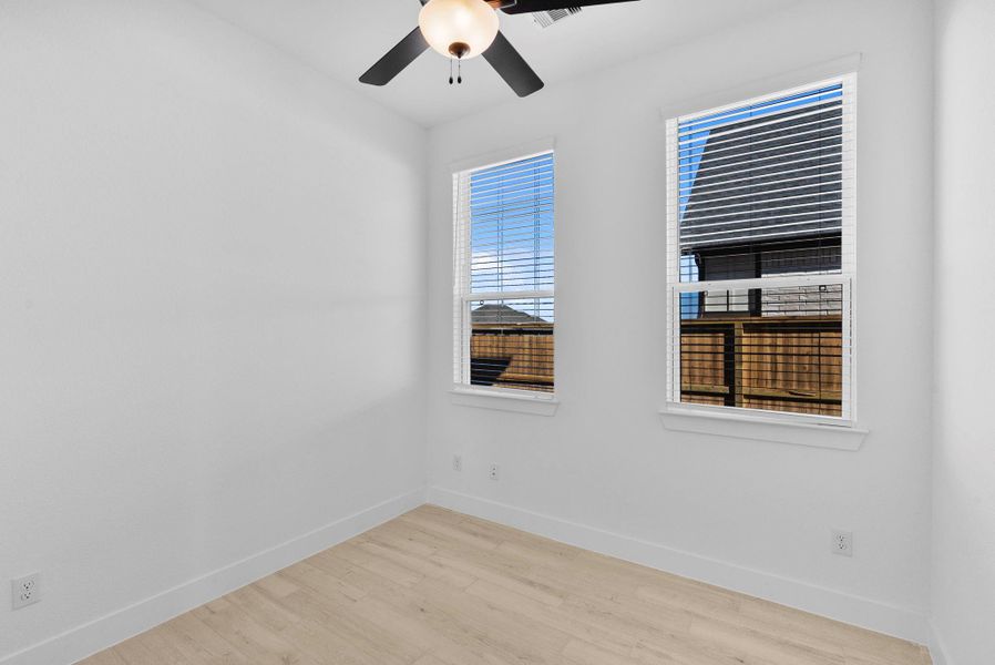 Spacious, unfurnished interior of a new home in Blue Heron, Mont Belvieu (Image 19).