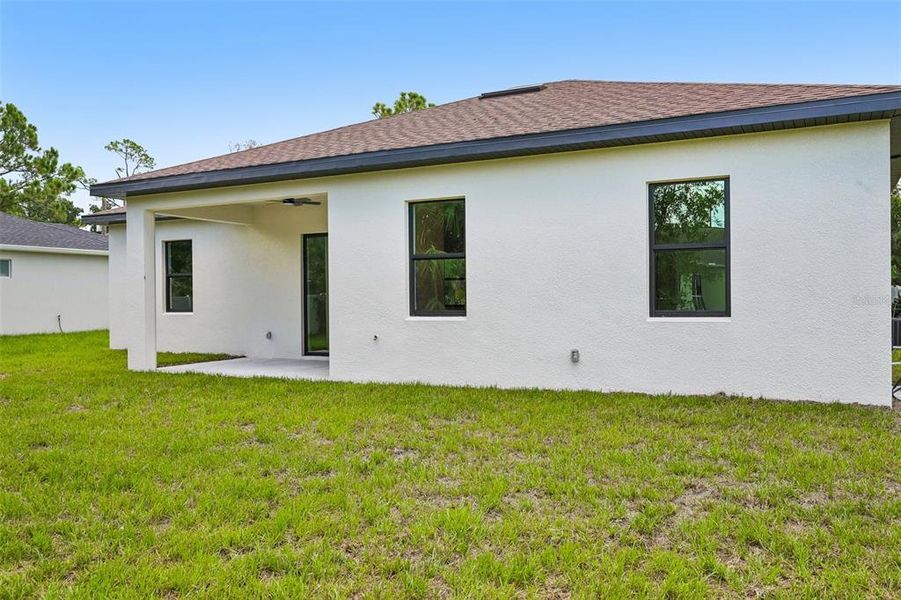 Exterior details and patio area of a home in , North Port (Image 3).