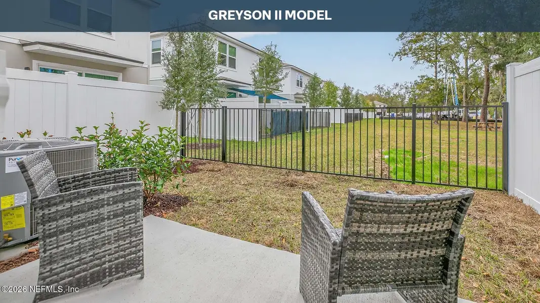 Exterior details and patio area of a home in Irongate Villas, Jacksonville (Image 3).