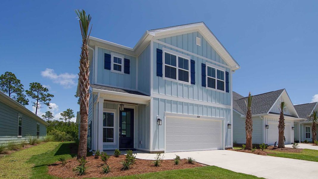 Front exterior of a new home in Breakfast Point East Phase I, Panama City Beach, FL, highlighting curb appeal (Image 2).