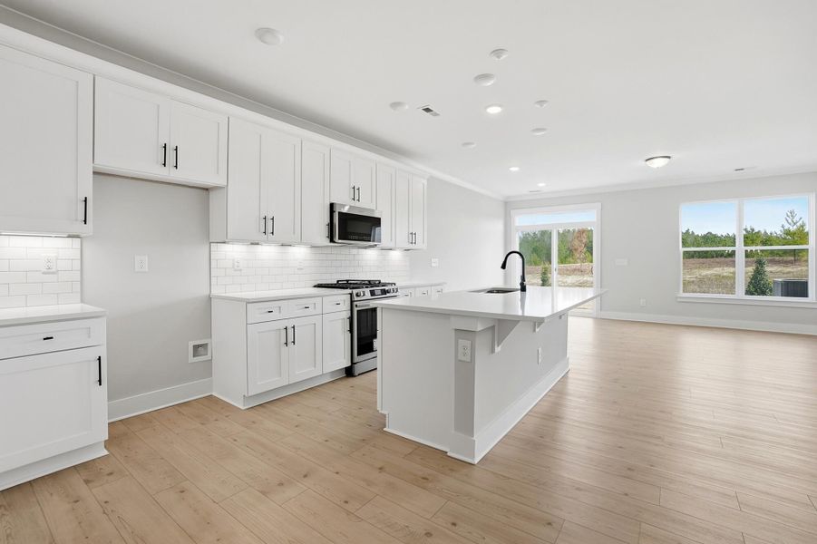 Furnished interior view inside a new home in Blythe Mill Townhomes, Waxhaw (Image 8). Furnished interior view inside a new home in Blythe Mill Townhomes, Waxhaw (Image 8).