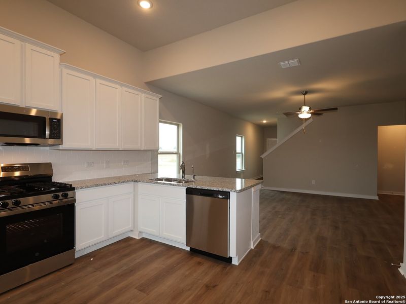 Furnished interior view inside a new home in Winding Brook, San Antonio (Image 8).