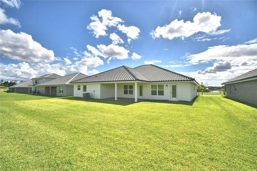 Exterior details and patio area of a home in Lake Juliana Estates, Auburndale (Image 27). Exterior details and patio area of a home in Lake Juliana Estates, Auburndale (Image 27).
