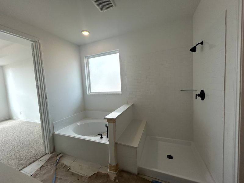 Construction progress - primary bath with separate walk in shower and soaking tub