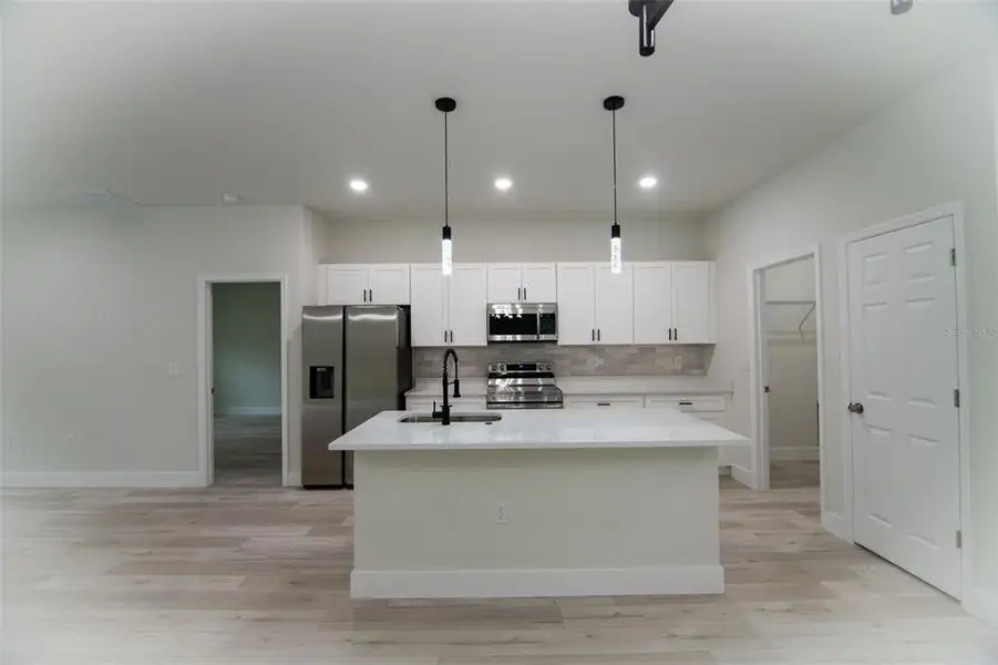 Furnished interior view inside a new home in , Ocala (Image 7).