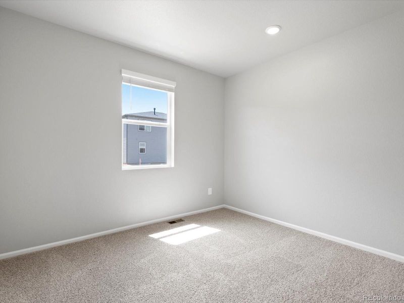 Spacious, unfurnished interior of a new home in Poudre Heights: The Alpine Collection, Windsor (Image 26).